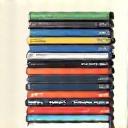 Stack of diverse video game cases
